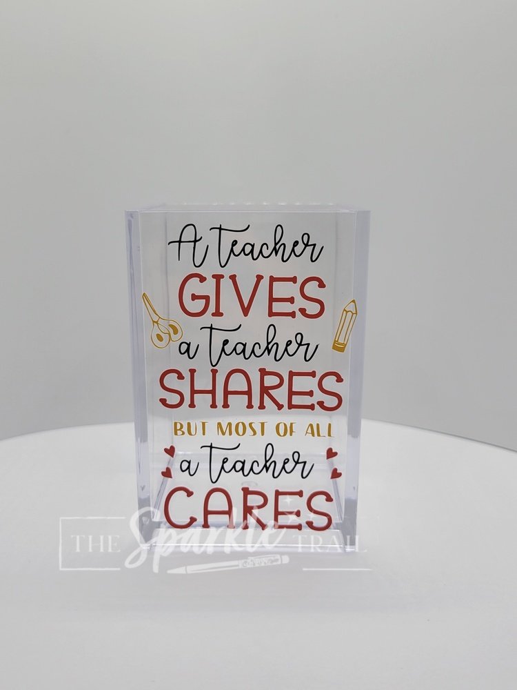 A teacher gives Pen Holder